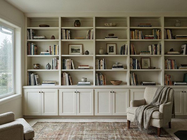 Floor-to-ceiling built-in bookcase scribed to the wall after, service example
